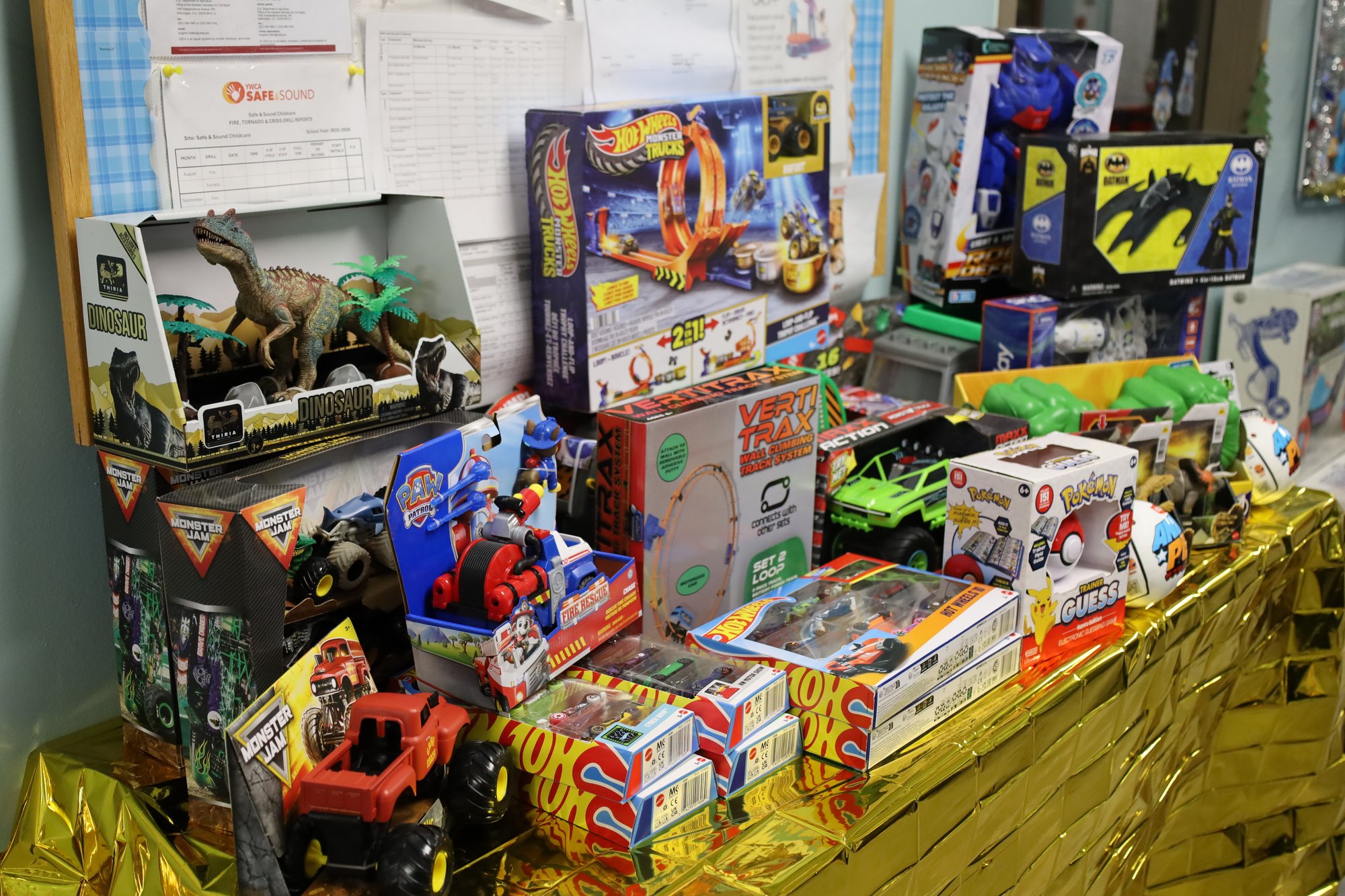 Toys-and-games-stacked-along-a-wall